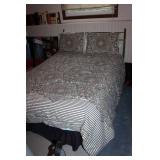 Double Bed with Brass Headboard and Patterned Comforter Set