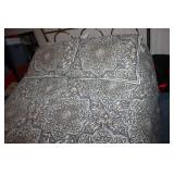 Double Bed with Brass Headboard and Patterned Comforter Set