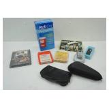 ReliOn Sharps Container, 8-track cleaner, camera strap, "Walk The Line" DVD
