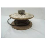 extension cord with outlet on wooden reel