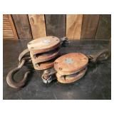 Two Large Pullys In Good Condition