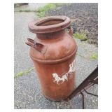 Tractor Seat, Milk Can and Stone Sharpener