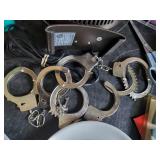 Misc lot of all kinds of things,  Handcuffs, Vintage Rotary desk Phone, and more