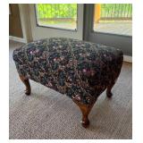 Navy Floral Pattern Upholstered Ottoman with Carved Wood Legs