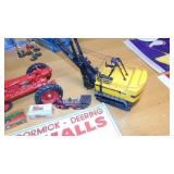 Diecast Farmall Tractor, P&H Crane, Tin Sign and other Items