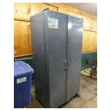 Metal Cabinet Filled with Tools and Garage Items