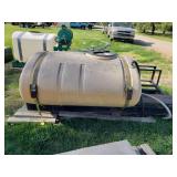 300 Gallon poly tank on a skid