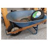 Wheelbarrow with Spare Tire and Bungee Cords