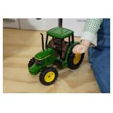 *2* Porcelain Dolls with John Deere Tractors