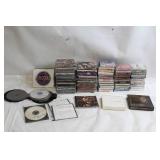 Large Collection of CDs Featuring Beatles, Elvis Presley, Willie Nelson & More