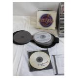 Large Collection of CDs Featuring Beatles, Elvis Presley, Willie Nelson & More