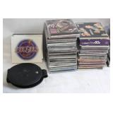 Large Collection of CDs Featuring Beatles, Elvis Presley, Willie Nelson & More