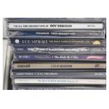 Large Collection of CDs Featuring Beatles, Elvis Presley, Willie Nelson & More