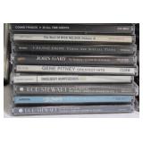 Large Collection of CDs Featuring Beatles, Elvis Presley, Willie Nelson & More