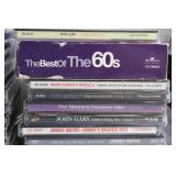 Large Collection of CDs Featuring Beatles, Elvis Presley, Willie Nelson & More
