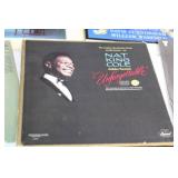 Collection of 11 Vintage Vinyl Records Featuring Tom Jones, Nat King Cole, and More