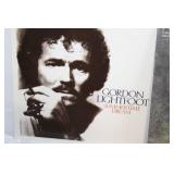 Collection of 11 Vintage Vinyl Records Featuring Tom Jones, Nat King Cole, and More