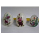 Set of 9 Decorative Porcelain and Glass Eggs Featuring Floral Designs