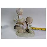 Collection of 9 Precious Moments Figurines