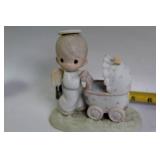 Collection of 9 Precious Moments Figurines