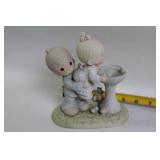 Collection of 9 Precious Moments Figurines