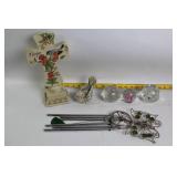 Decorative Collection: Cross Statue, Bird Figurine, and Glass Paperweights