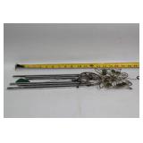 Decorative Collection: Cross Statue, Bird Figurine, and Glass Paperweights