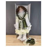 New 1st Impressions Porcelain Doll with Green Dress and Bonnet *B