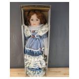 New 1st Impressions Porcelain Doll with Light Blue Dress *B