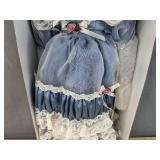 New 1st Impressions Porcelain Doll with Light Blue Dress *B