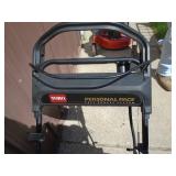 Toro GTS Recycler with electric start & charger with bagger. Used condition. Tested & works. As shown.