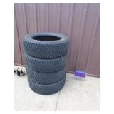 Bridgestone Blizzak P245/65R18 tires. Used condition. Approx ½ tread left. As shown.