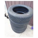 Bridgestone Blizzak P245/65R18 tires. Used condition. Approx ½ tread left. As shown.
