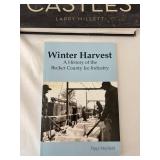 Collection of 4 Books Featuring Historical and Thematic Topics