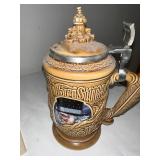 Christmas Ceramic Collectibles Set with Santa, Carolers, and Stein