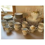64-Piece Palate & Plate Fine Porcelain Dinnerware Set with Gold Trim