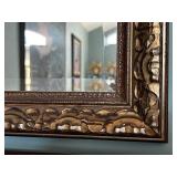 Ornate Gold Framed Wall Mirror with Textured Detailing