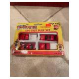 Collection of Vintage Toy Sets: Bongards Creamery Barn, Radio Flyer Wagon, Firefighter Die Cast