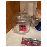 Holiday and Fall-Themed Kitchenware Collection with Jars, Candle Holders, and Decor