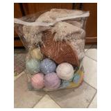 Collection of Crocheted Blankets and Yarn