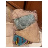 Collection of Crocheted Blankets and Yarn