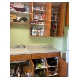 All Contents of Cupboards. A Collection of Household and Cleaning Supplies with Assorted Caps and Clothing