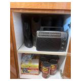 All Contents of Cupboards. A Collection of Household and Cleaning Supplies with Assorted Caps and Clothing