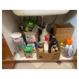 All Contents of Cupboards. A Collection of Household and Cleaning Supplies with Assorted Caps and Clothing