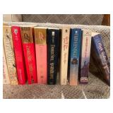 Collection of Assorted Paperback Books, VHS Tapes, and Craft Guides