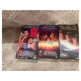 Collection of Assorted Paperback Books, VHS Tapes, and Craft Guides