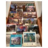 Collection of 13 Assorted Jigsaw Puzzles including Thomas Kinkade Designs