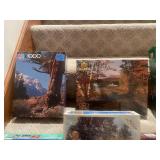 Collection of 13 Assorted Jigsaw Puzzles including Thomas Kinkade Designs