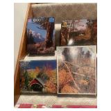 Collection of 13 Assorted Jigsaw Puzzles including Thomas Kinkade Designs