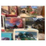 Collection of 13 Assorted Jigsaw Puzzles including Thomas Kinkade Designs